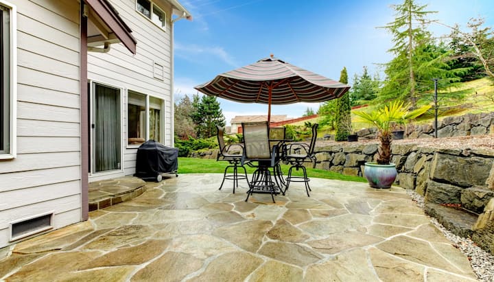 Create an Outdoor Oasis with Stunning Concrete Patio in Topeka, KS - Enjoy Beautifully Textured and Patterned Concrete Surfaces for Your Entertaining and Relaxation Needs.