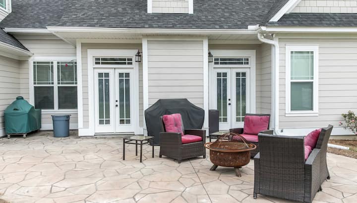 Elevate Your Outdoor Living Space with Stunning Stamped Concrete Patio in Topeka, KS - Choose from a Variety of Creative Patterns and Colors to Achieve a Unique and Eye-Catching Look for Your Patio with Long-Lasting Durability and Low-Maintenance.